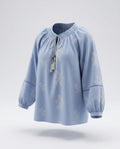 Blusa azul bordada